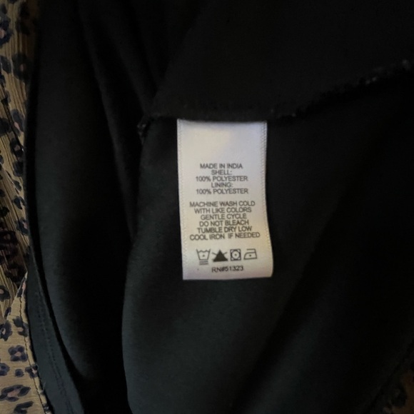 CeCe Smocked Off-Shoulder
Leopard Print Blouse in Spice - Picture 2 of 10